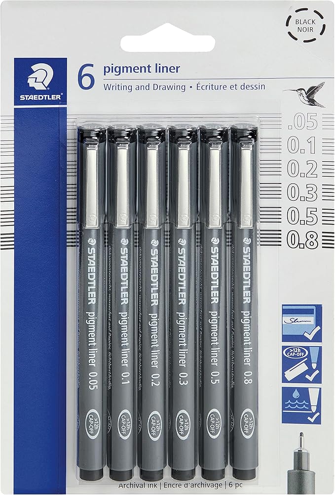 A package of six Staedtler pigment liner pens for writing and drawing, perfect for any architect or student. Displayed in a clear plastic case, the pens are labeled with tip sizes: 0.05, 0.1, 0.2, 0.3, 0.5, and 0.8 mm—a great pick for your Holiday Gift Guide.
